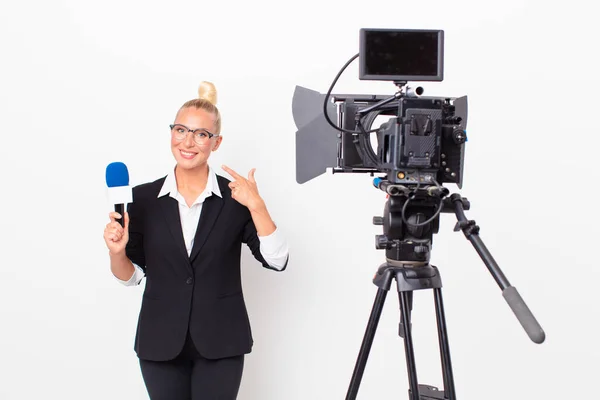 Pretty Blond Woman Smiling Confidently Pointing Own Broad Smile Holding — Stock Photo, Image