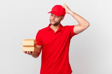 burger deliver man feeling puzzled and confused, scratching head