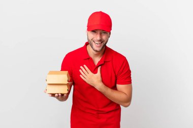 burger deliver man laughing out loud at some hilarious joke