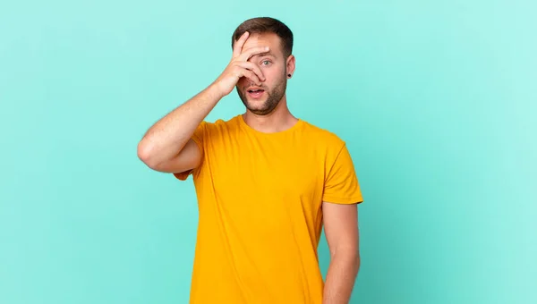 Handsome Blonde Man Looking Shocked Scared Terrified Covering Face Hand — Stockfoto