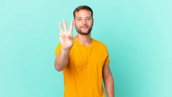 Handsome Blonde Man Smiling Looking Friendly Showing Number Three — 图库照片