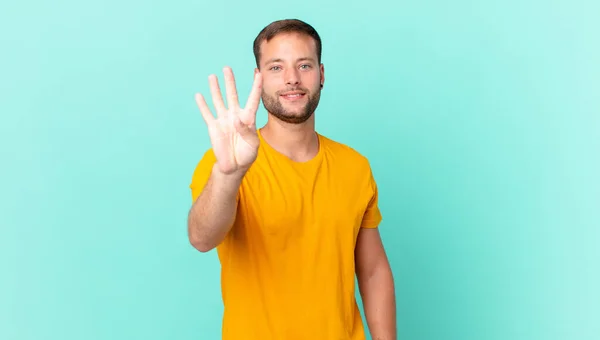 Handsome Blonde Man Smiling Looking Friendly Showing Number Four — Stockfoto