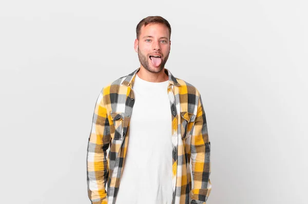 Handsome Blonde Man Cheerful Rebellious Attitude Joking Sticking Tongue Out — Foto Stock