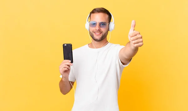 Feeling Proud Smiling Positively Thumbs Listening Music Headphones Smartphone — Stock Photo, Image