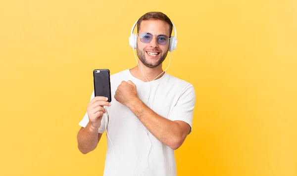 Feeling Happy Facing Challenge Celebrating Listening Music Headphones Smartphone — Stockfoto