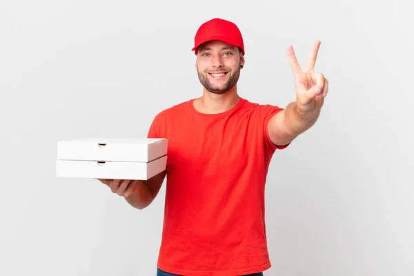 Pizza Deliver Man Smiling Looking Happy Gesturing Victory Peace — Stock Photo, Image