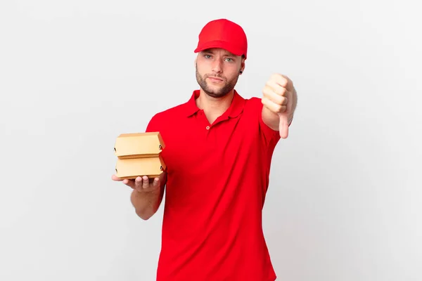 Hamburger Dağıtan Adam Kendini Kötü Hissediyor Baş Parmağını Kaldırıyor — Stok fotoğraf