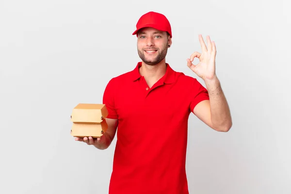 Burger Deliver Man Feeling Happy Showing Approval Okay Gesture — Stok fotoğraf