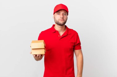 Hamburger insanı mutsuz ve mızmız yapar, mutsuz bir bakışla ve ağlayarak.