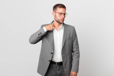 handsome businessman feeling stressed, anxious, tired and frustrated
