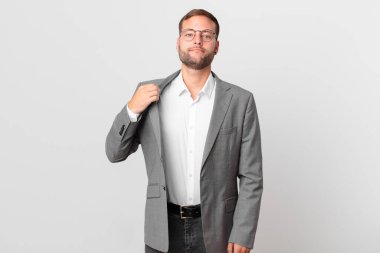 handsome businessman looking arrogant, successful, positive and proud