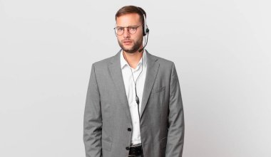 telemarketer businessman feeling puzzled and confused