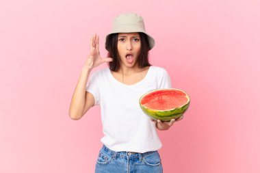 screaming with hands up in the air