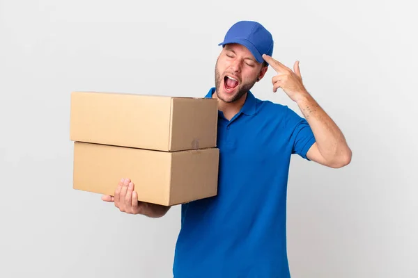 Package Deliver Man Looking Unhappy Stressed Suicide Gesture Making Gun — Stock Photo, Image