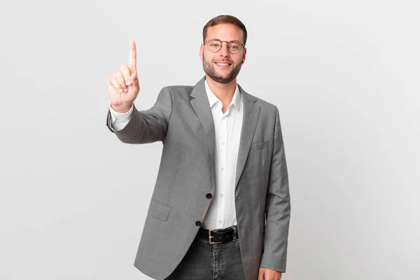 Handsome Businessman Smiling Looking Friendly Showing Number One — Φωτογραφία Αρχείου