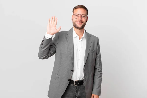 Handsome Businessman Smiling Happily Waving Hand Welcoming Greeting You — 스톡 사진