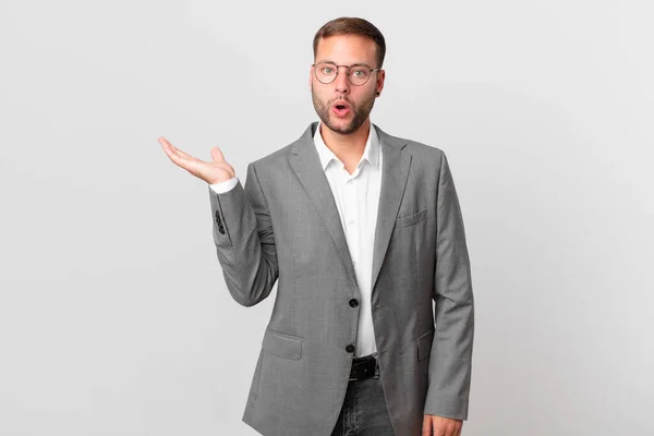 Handsome Businessman Looking Surprised Shocked Jaw Dropped Holding Object — Photo