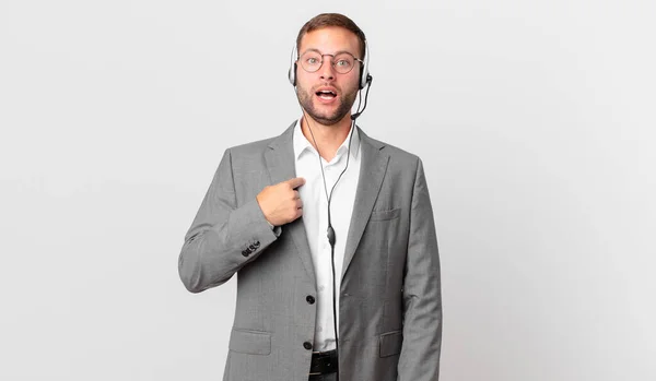 Telemarketer Businessman Looking Shocked Surprised Mouth Wide Open Pointing Self — Zdjęcie stockowe