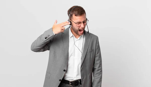 Telemarketer Businessman Looking Unhappy Stressed Suicide Gesture Making Gun Sign — Stockfoto