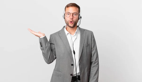 Telemarketer Businessman Looking Surprised Shocked Jaw Dropped Holding Object — Fotografia de Stock