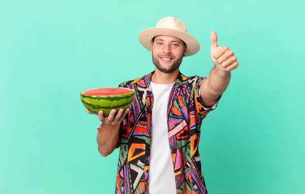 Handsome Traveler Man Feeling Proud Smiling Positively Thumbs Holding Watermelon — Zdjęcie stockowe