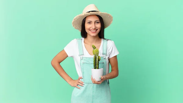 Pretty Farmer Woman Smiling Happily Hand Hip Confident Holding Cactus — Foto de Stock
