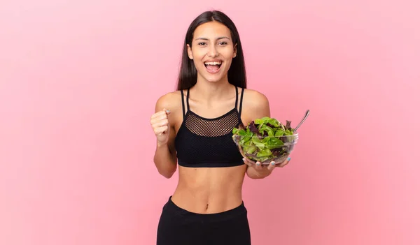 Hispanic Fitness Woman Feeling Shocked Laughing Celebrating Success Holding Salad — Stok Foto