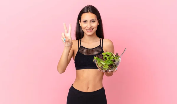 Hispanic Fitness Woman Smiling Looking Friendly Showing Number Two Holding — ストック写真