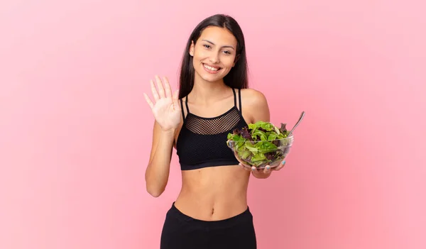 Hispanic Fitness Woman Smiling Happily Waving Hand Welcoming Greeting You — Fotografia de Stock