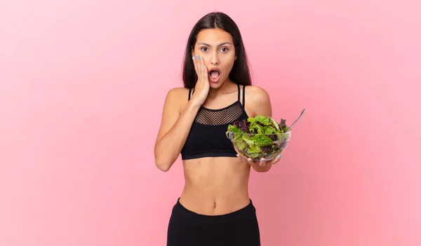 Hispanic Fitness Woman Feeling Shocked Scared Holding Salad — Fotografia de Stock