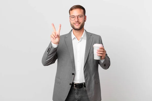 Schöner Geschäftsmann Mit Einem Kaffee Zum Mitnehmen — Stockfoto