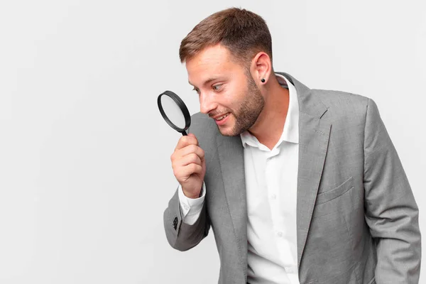 Handsome Businessman Finfing Magnifying Glass — Stock Photo, Image