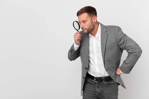 Handsome Businessman Finfing Magnifying Glass — Stock Photo, Image