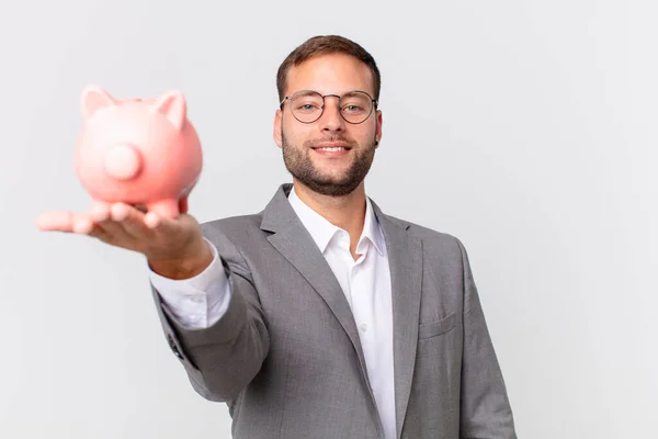 Hombre Negocios Guapo Sosteniendo Una Alcancía Concepto Ahorro —  Fotos de Stock