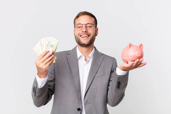 Hombre Negocios Guapo Sosteniendo Una Alcancía Concepto Ahorro —  Fotos de Stock