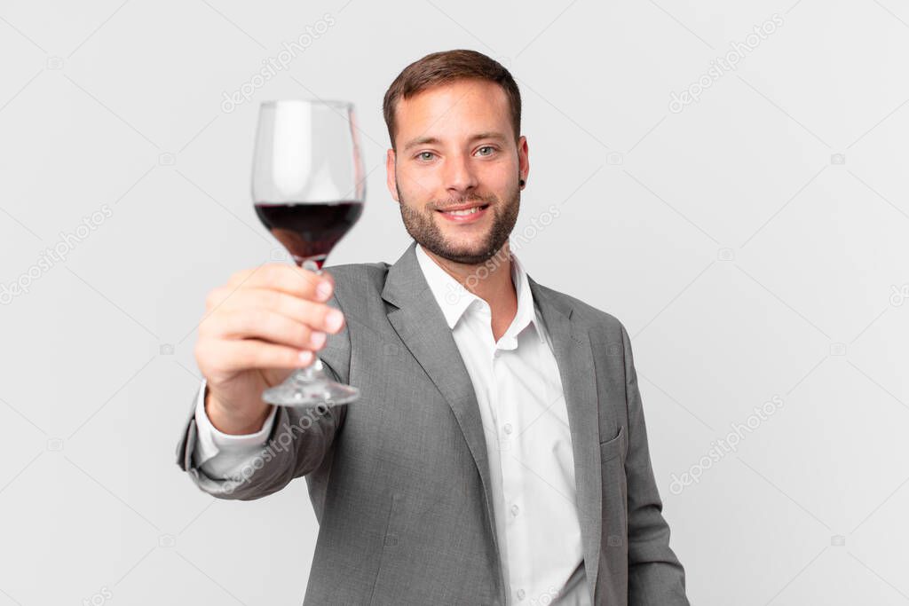handsome businessman having a wine