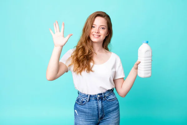 Smiling Looking Friendly Showing Number Five Holding Milk Bottle — Stock Photo, Image