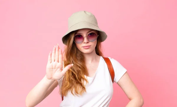 Red Head Pretty Woman Tourist Looking Serious Showing Open Palm — Stock Photo, Image