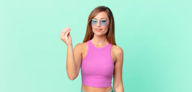 Güzel yetişkin bir kadın kapiş ya da para hareketi yapıyor, sana ödemeni söylüyor.