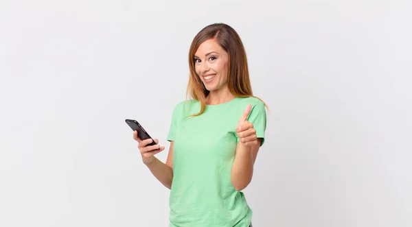 Pretty Woman Feeling Proud Smiling Positively Thumbs Using Smartphone — Stock Photo, Image