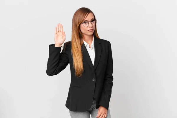 Pretty Woman Looking Serious Showing Open Palm Making Stop Gesture — Stock Photo, Image