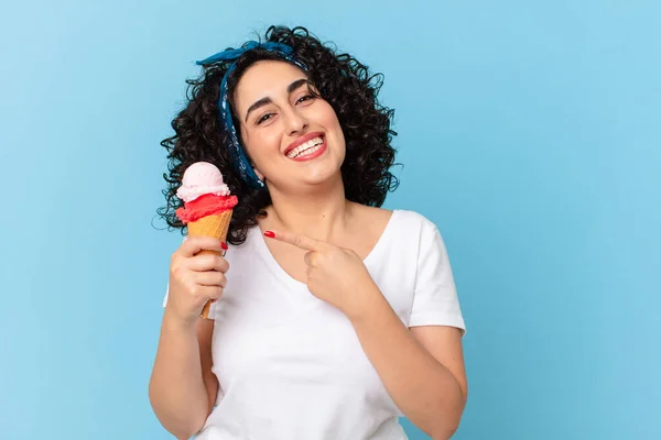 pretty arab woman with and ice cream