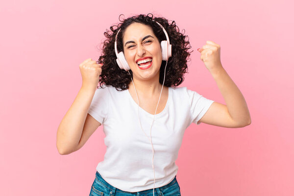 pretty arab woman with headphones.