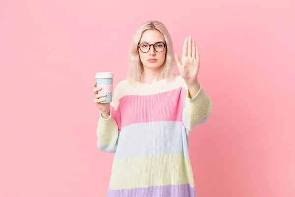 Blond Pretty Woman Looking Serious Showing Open Palm Making Stop — Stock Photo, Image