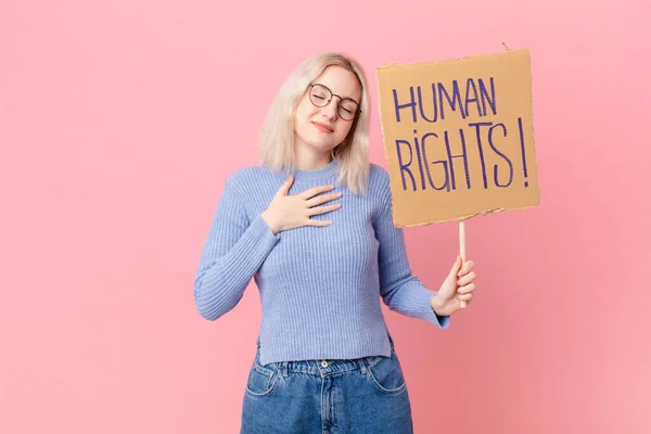 Blond Woman Protesting Cardboard Banner —  Fotos de Stock