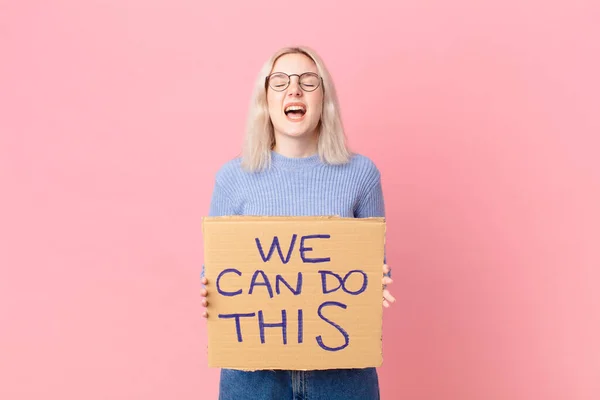 Blond Woman Protesting Cardboard Banner —  Fotos de Stock