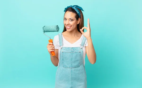 Young Hispanic Woman Feeling Happy Showing Approval Okay Gesture Painting — Fotografia de Stock