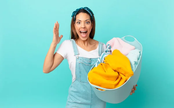 Young Hispanic Woman Feeling Happy Astonished Something Unbelievable Washing Clothes — Stok Foto