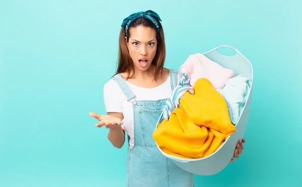 Young Hispanic Woman Feeling Extremely Shocked Surprised Washing Clothes — Stock Photo, Image