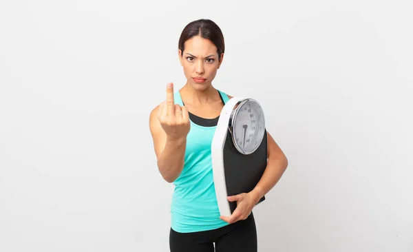 Young Hispanic Woman Feeling Angry Annoyed Rebellious Aggressive Holding Scale — Stok fotoğraf